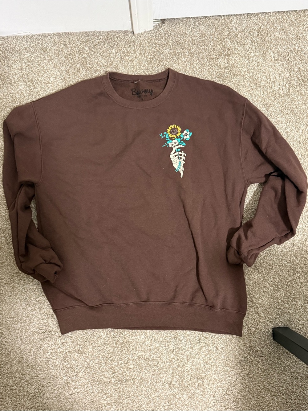 Women’s Brown Crewneck Sweatshirt with Floral Skeleton Design